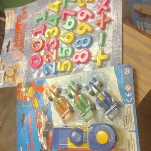 Magnetic numbers and super track set and eight sounded play gun and batman tatts